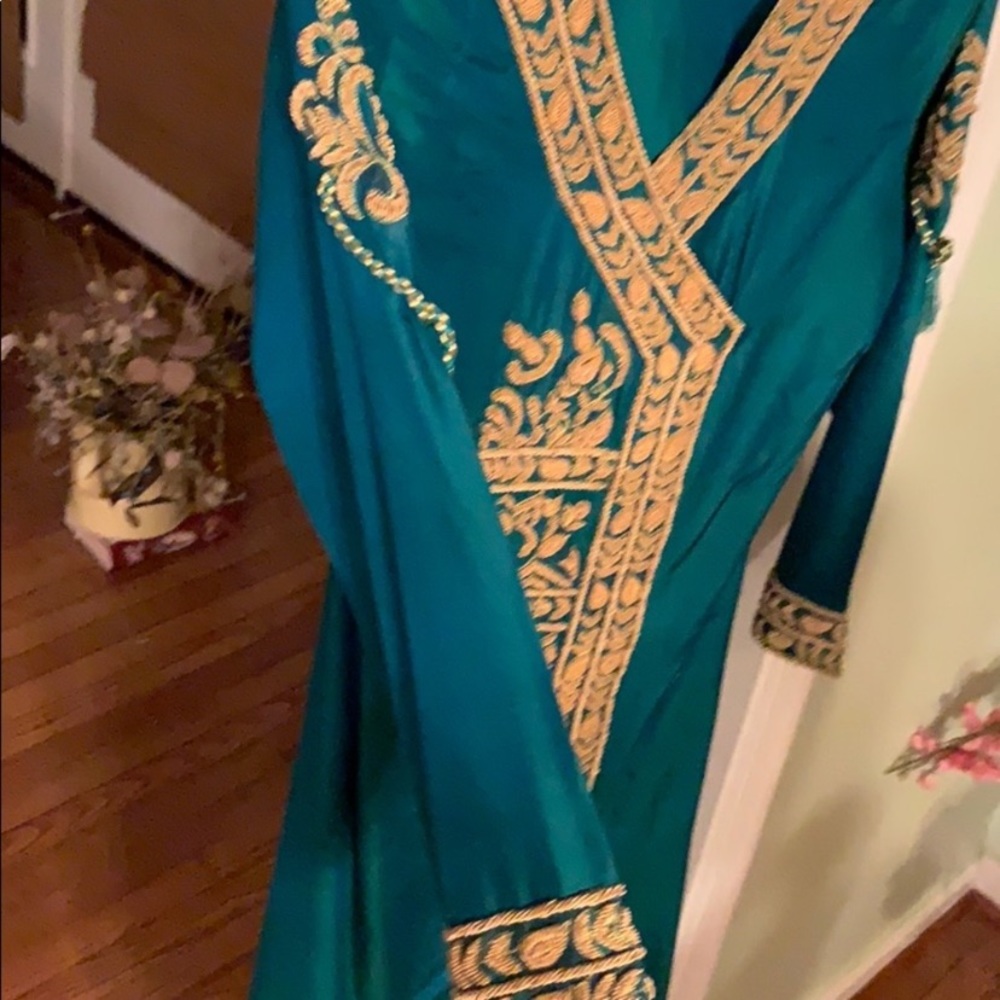 Turquoise heavy embroidered kameez shalwar